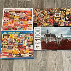 Five 1000 piece puzzles